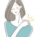 woman suffering from stiff shoulders